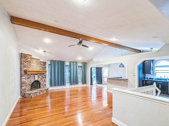 Entrance into Living Room with vaulted ceiling.