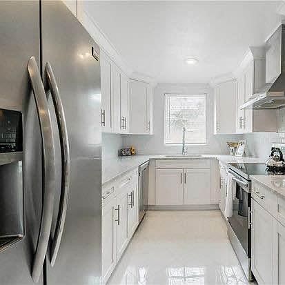 5th image of 7309 N Taliaferro Ave