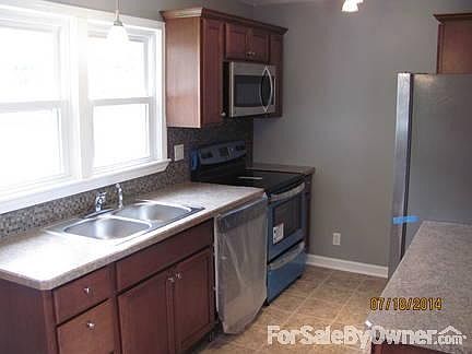 Kitchen
						:
						New Maple Kraftmaid cabinets & countertops 
Stainless appliances included