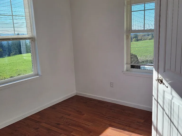 Bedroom #1. Door on right is closet.