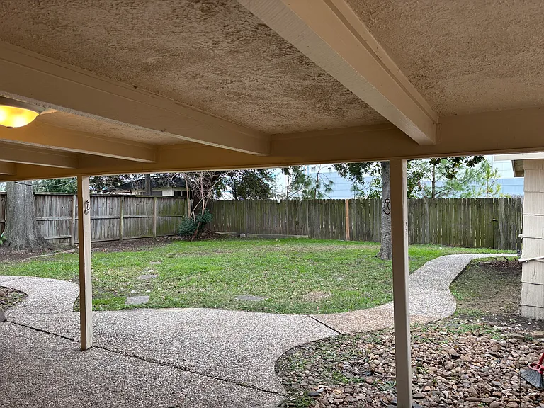 View of backyard from the covered porch.