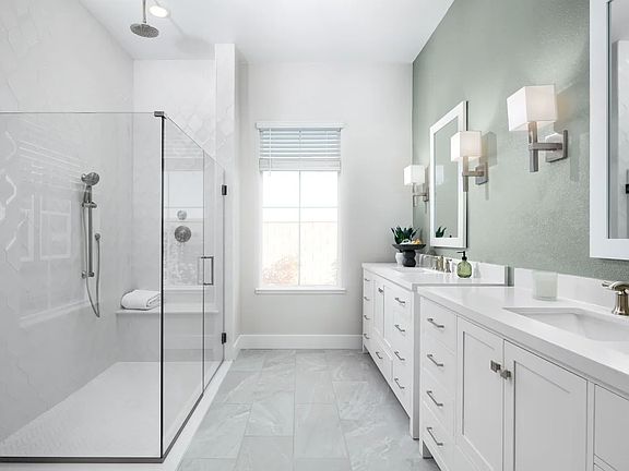 Primary bath with glass shower enclosure