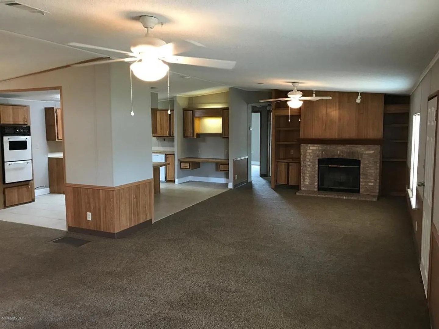Remodeled 3 bed 2 bath 1,628 sq ft home with a large screen — Photo 2