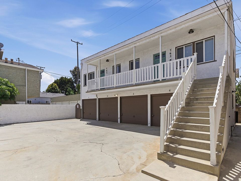 Private upper-unit location in a quiet 4-plex, buffered from the street by a front residence