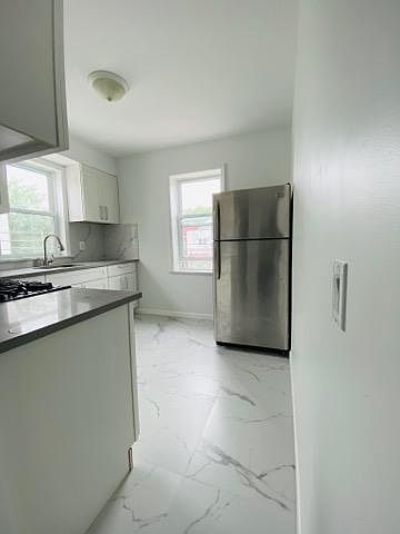 1st image of 1664 E 32nd St