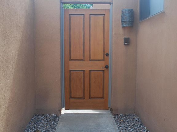 outside wall, door into front patio