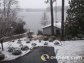 View of boat house and lake with a rare dusting of snow!