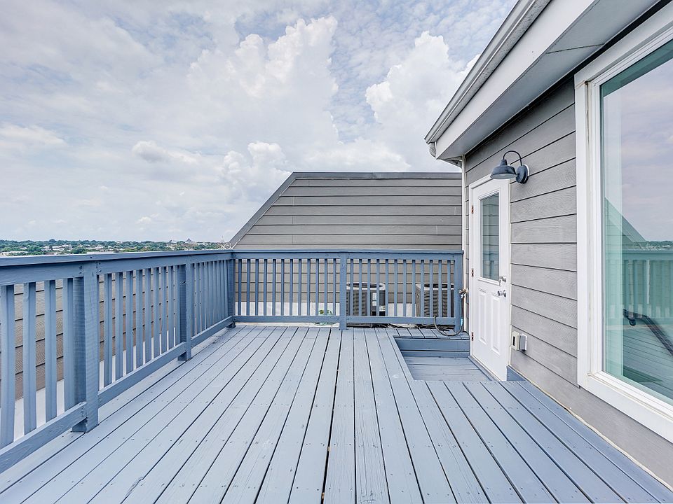 Private Roof Deck with Tree Top Views to the Washington Capitol and Beyond