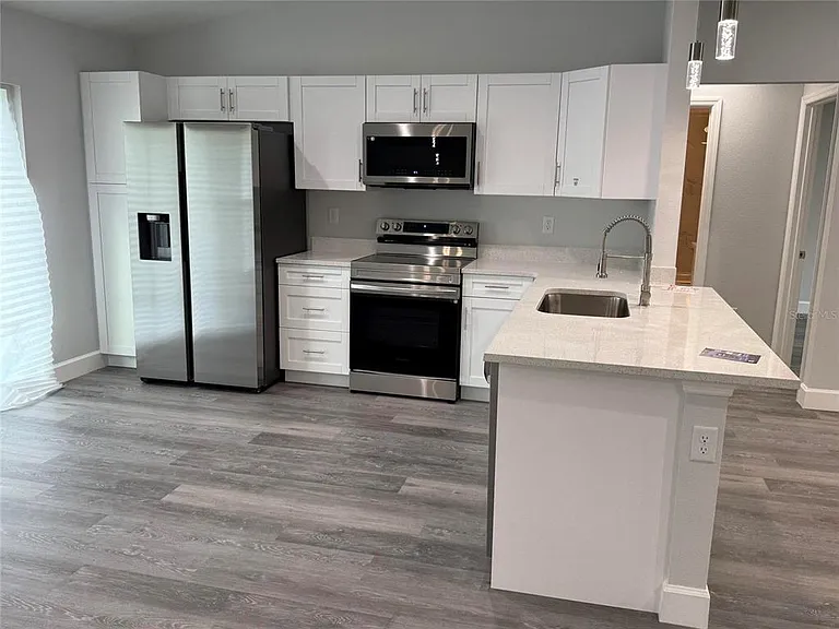 15854 SW 38th Pl — Photo 3