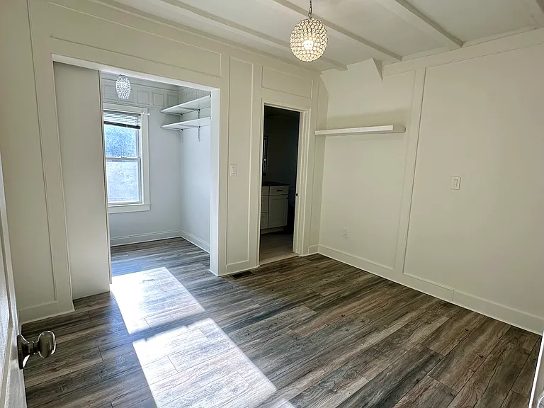 Primary bedroom with walk in closet
