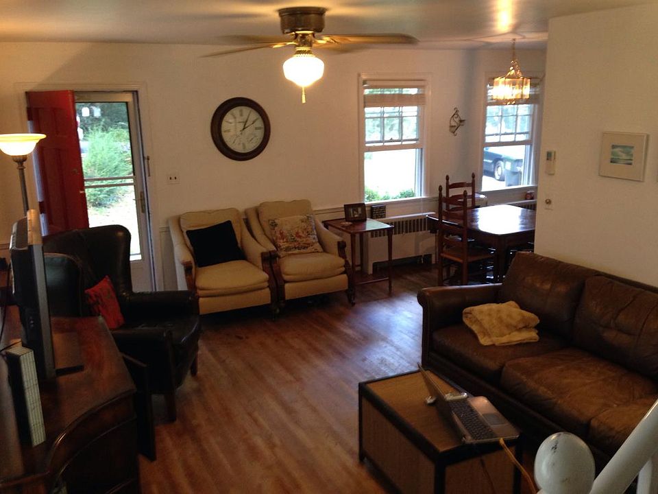 Open concept living with hardwood floor.