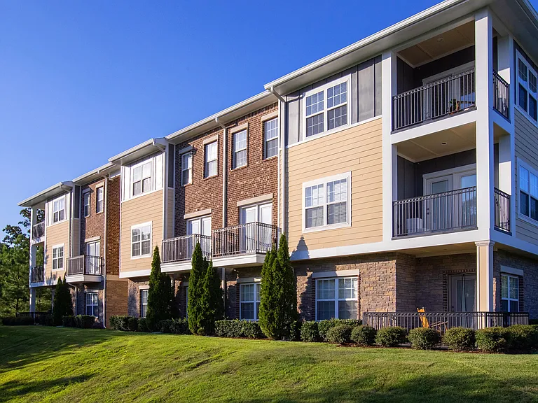 Uncover outdoor allure at Rowan Park with meticulous landscaping, revitalized exteriors, and private patios and balconies that redefine the art of living.