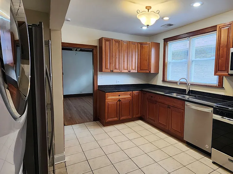Kitchen has brand new stainless steel appliances including a refrigerator, dishwasher, stove/oven and over-the-range microwave. There is also an in-unit washer and dryer and plenty of cabinet space.