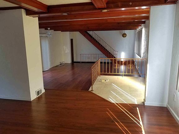 Dining room looking into living room & entrance