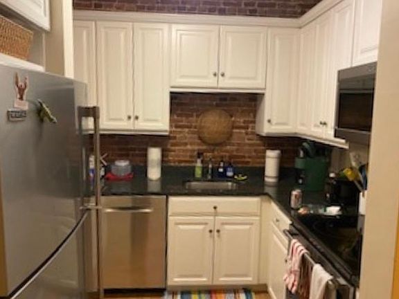 Brand new stainless appliances and granite countertops provide fully functional kitchen.
