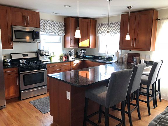 Cherry cabinets, granite counters and ss appliances