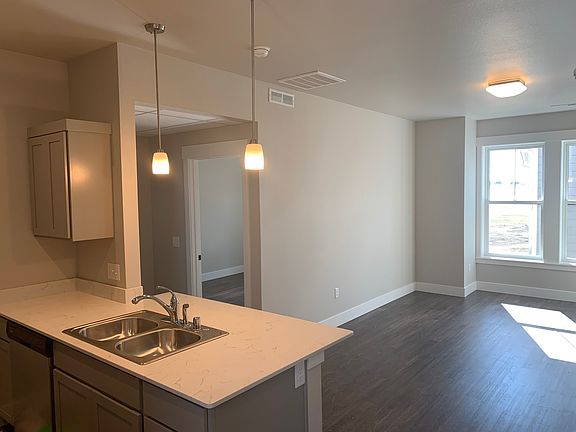 4th image of 6048 Farmstead Ave