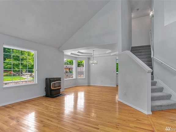 Gleaming Hardwoods & Vaulted Ceilings Greet You Upon Entry!