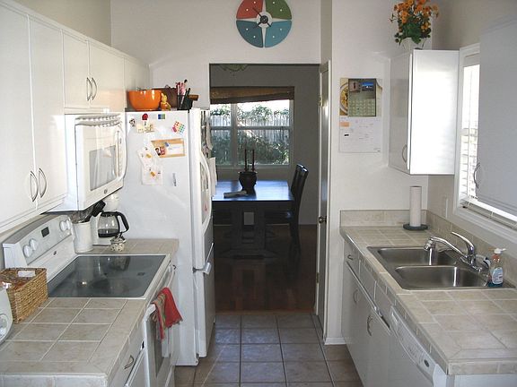 Kitchen with Tile Floors and Tiled Counters