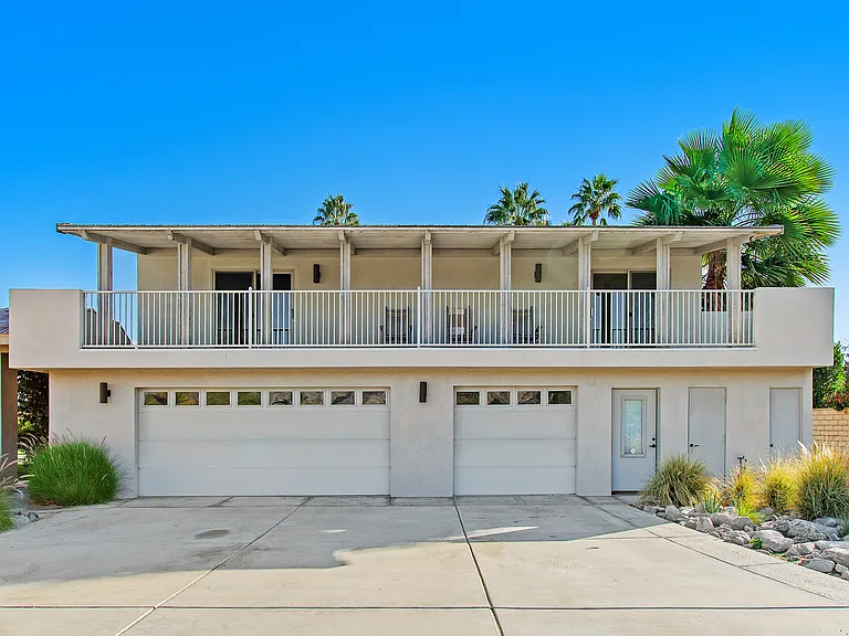 GUEST HOUSE HAS 2 BEDROOMS, ONE BATHROOM AND OUTDOOR COVERED DECK