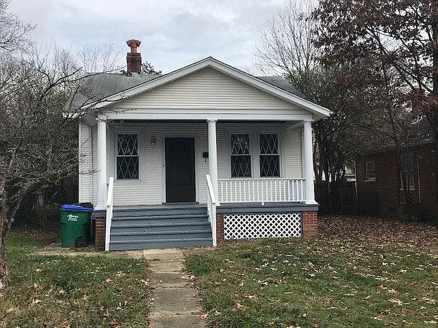 Front of the House featuring a Charming Porch
