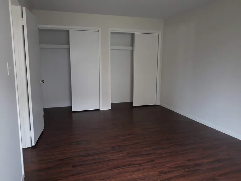 Bedroom showing the two closets.