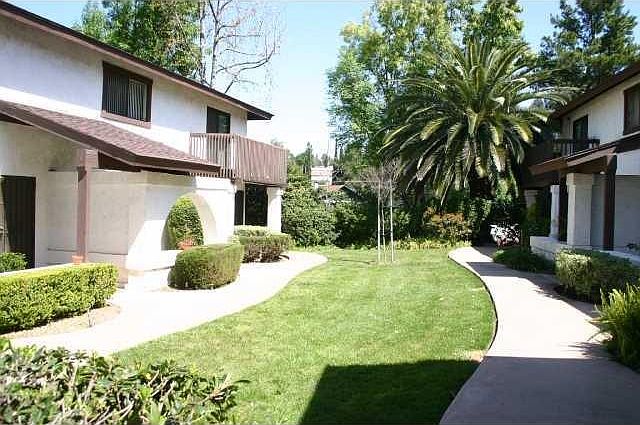 Paseo walkway to townhome