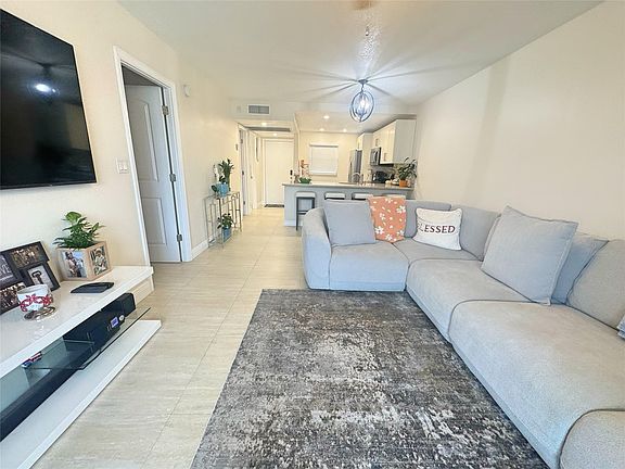 4th image of 9440 Poinciana Place #105