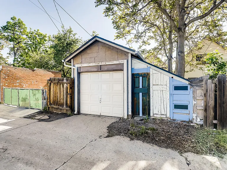 1 car garage with storage on side and alley access