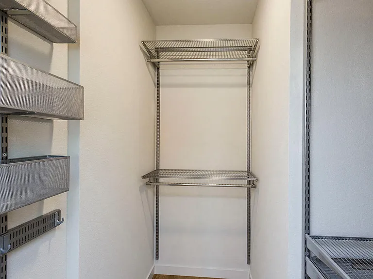 Built-in closet organizers in select apartments