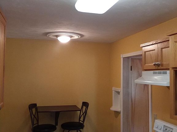 Nice kitchen with wall mount table and stools