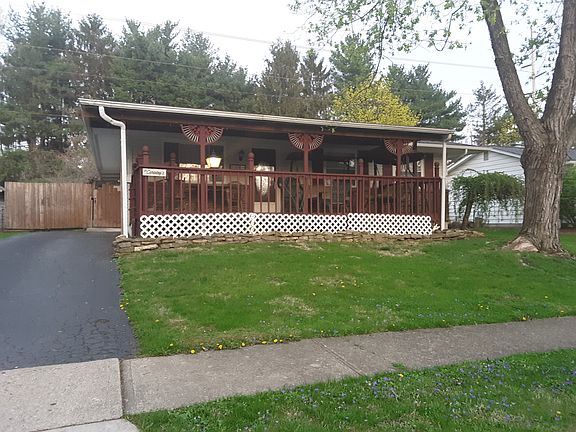 Front home with side driveway