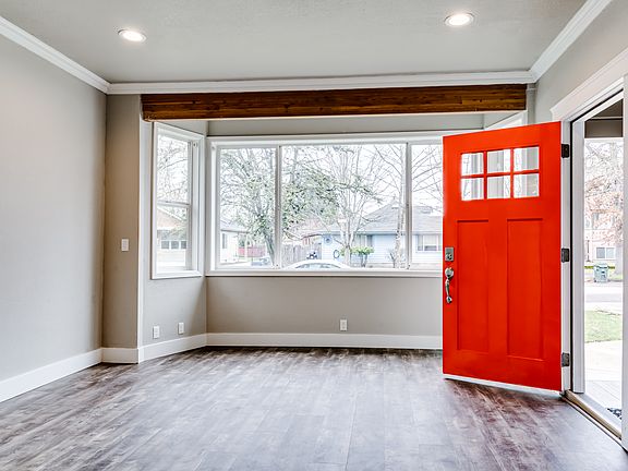 Great room concept with livingroom area enjoying a bay window area.