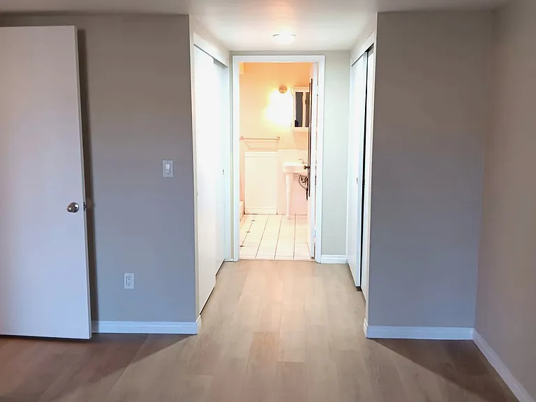 From master bed into master bath by closets.