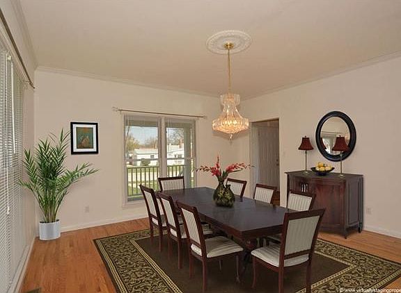 Dining Room. This photo is virtually staged.