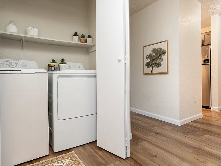 Explore this chic laundry space, designed for efficiency and style within your home.