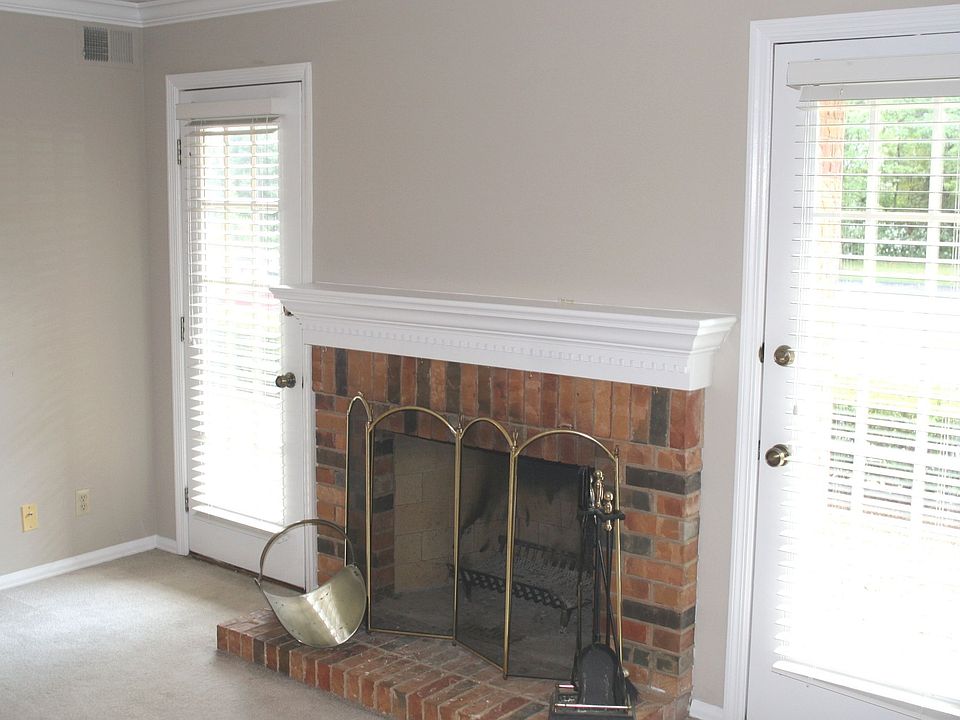 Living Room w/French Doors Flanking the Fireplace! 