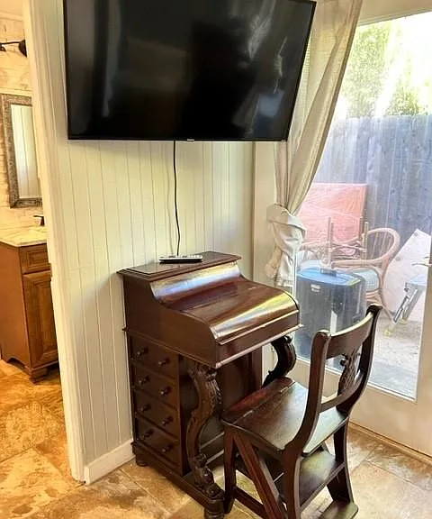 Mahogany writing desk and TV in Second Master Bedroom