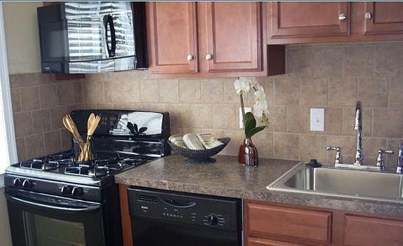 Renovated kitchens equipped with black appliances, stack-abl