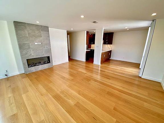 Unit #222 living room with recessed can lighting throughout!