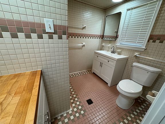 First floor full bathroom with retro tile & new fixtures