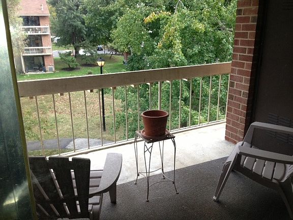 Balcony with partial pond views