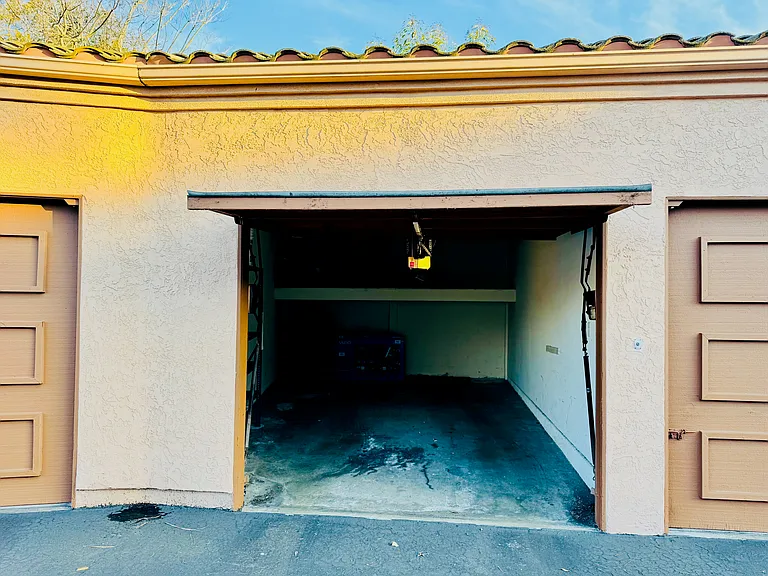Dedicated Single Car Garage. Additional Reserved Parking Spot is uncovered nearby the condo.