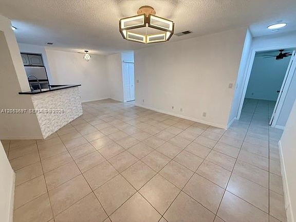 3rd image of 3410 Pinewalk Dr N APT 818