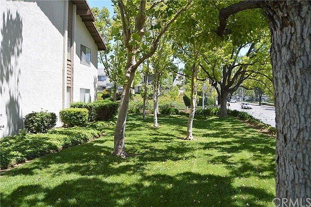 Lush green belt surrounds the gated community.