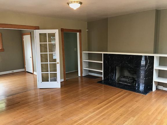 Original top nailed oak floors, french doors to dining room (or office/other)
