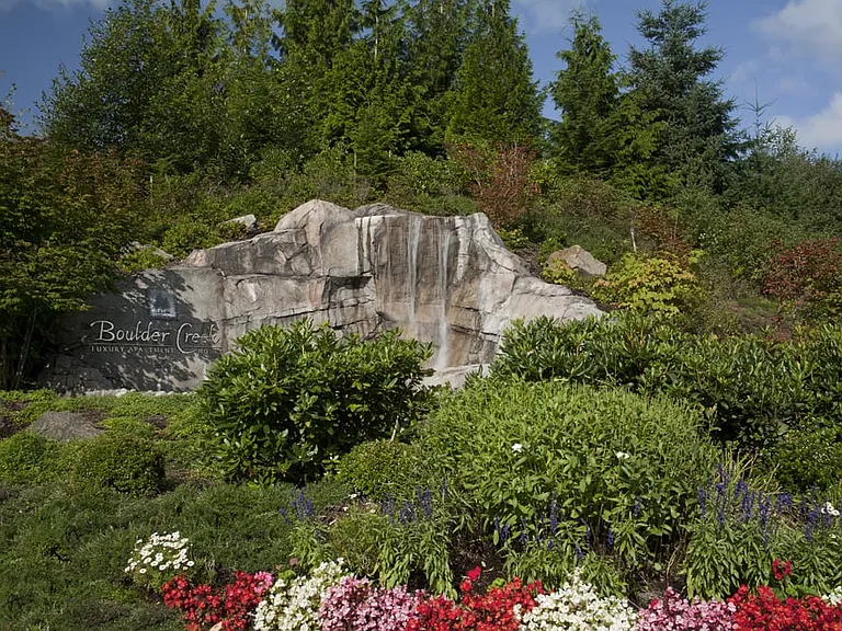 Fully landscaped with welcoming water feature