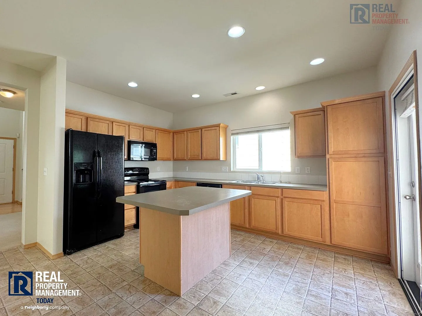 Spacious 4-Bedroom Fife Home | Fenced Patio & 2-Car Garage — Photo 2