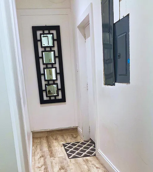 Cozy hallway with modern decor and a welcoming atmosphere.