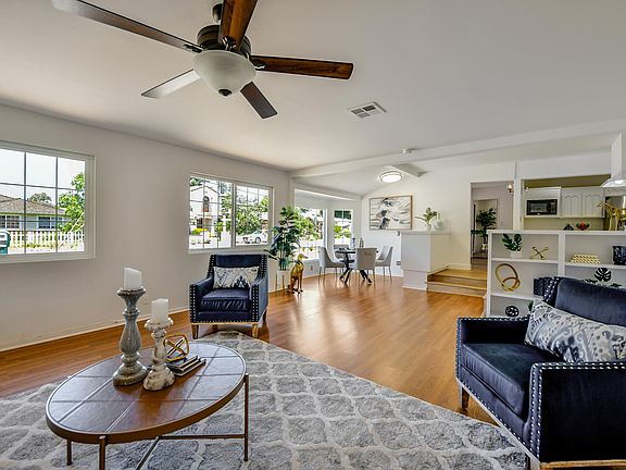 Living room opens to breakfast area